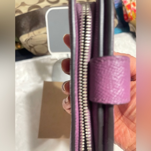 Coach Metallic Purple Wallet
$45 $165 - Picture 4 of 9